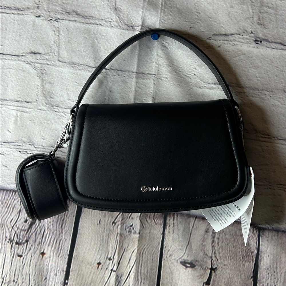 Lululemon “Leather” mini bag or mini sack, cactus leather